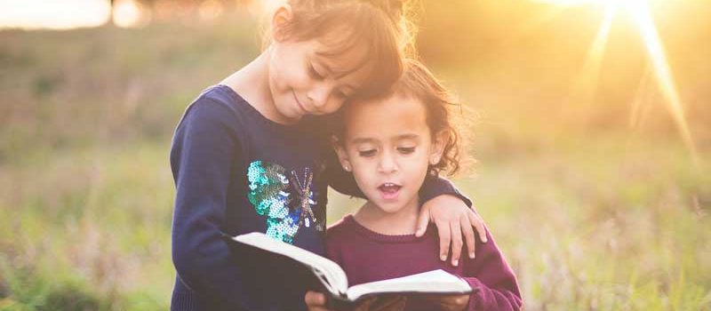 foster siblings reading book