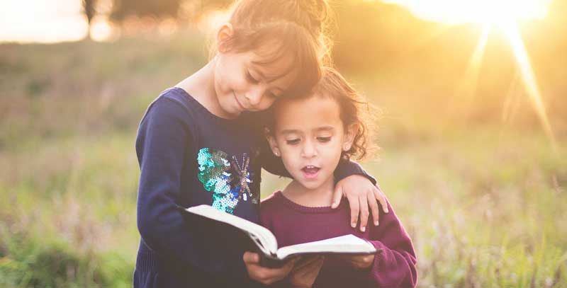 foster siblings reading book