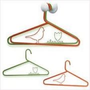 Hangers with decorative flowers and birds.