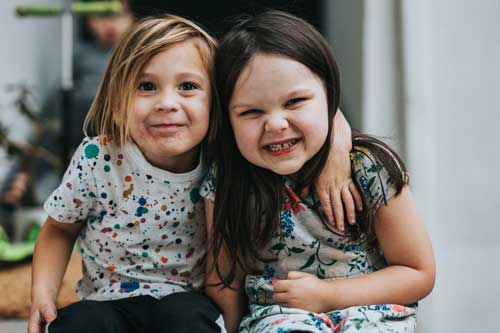 girls sitting together.