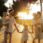 A family walking together at sunset